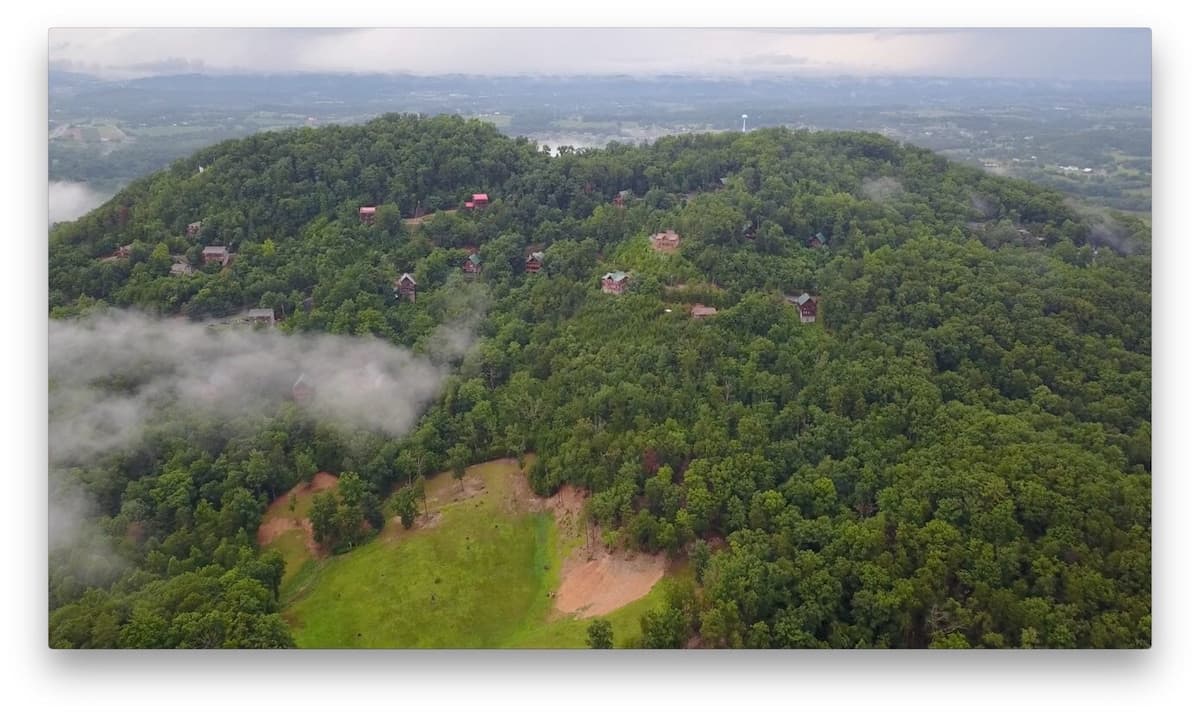 Aerial view of the wooded ridge surrounding Thistle Britches
