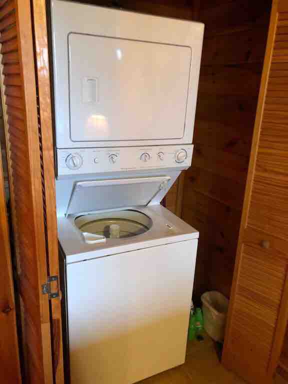 Cabin interior with warm wood details and pine walls
