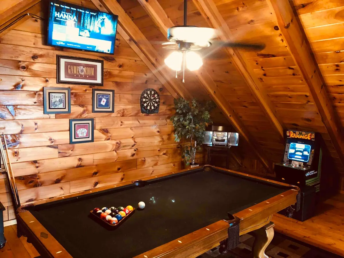Game room with pool table at Thistle Britches